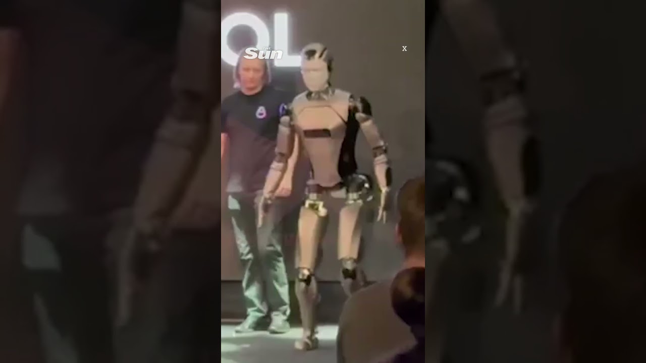 Hilarious moment Putin robot lookalike falls flat on its face on debut outing