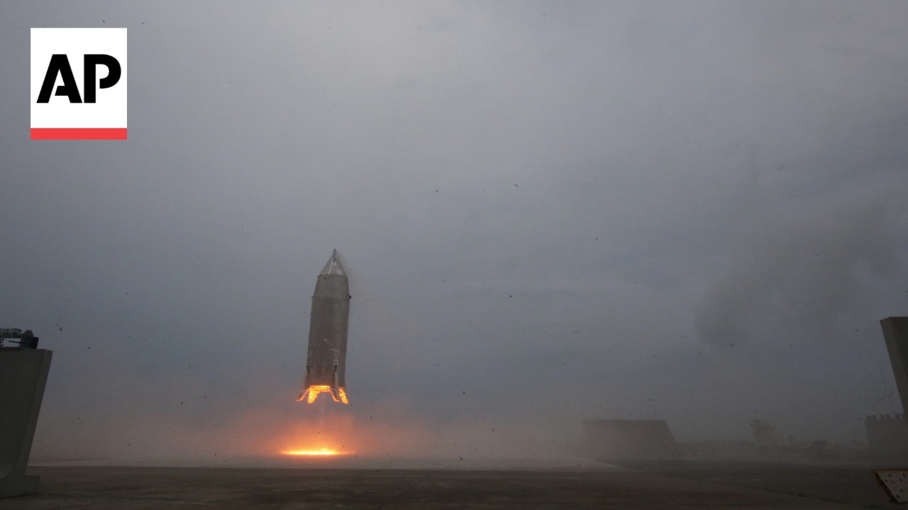 Japan space agency's experimental reusable rocket hovers and lands safely in first test flight