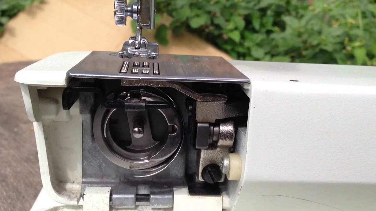 Riccar 1528  sewing machine adjustment. Feed dog