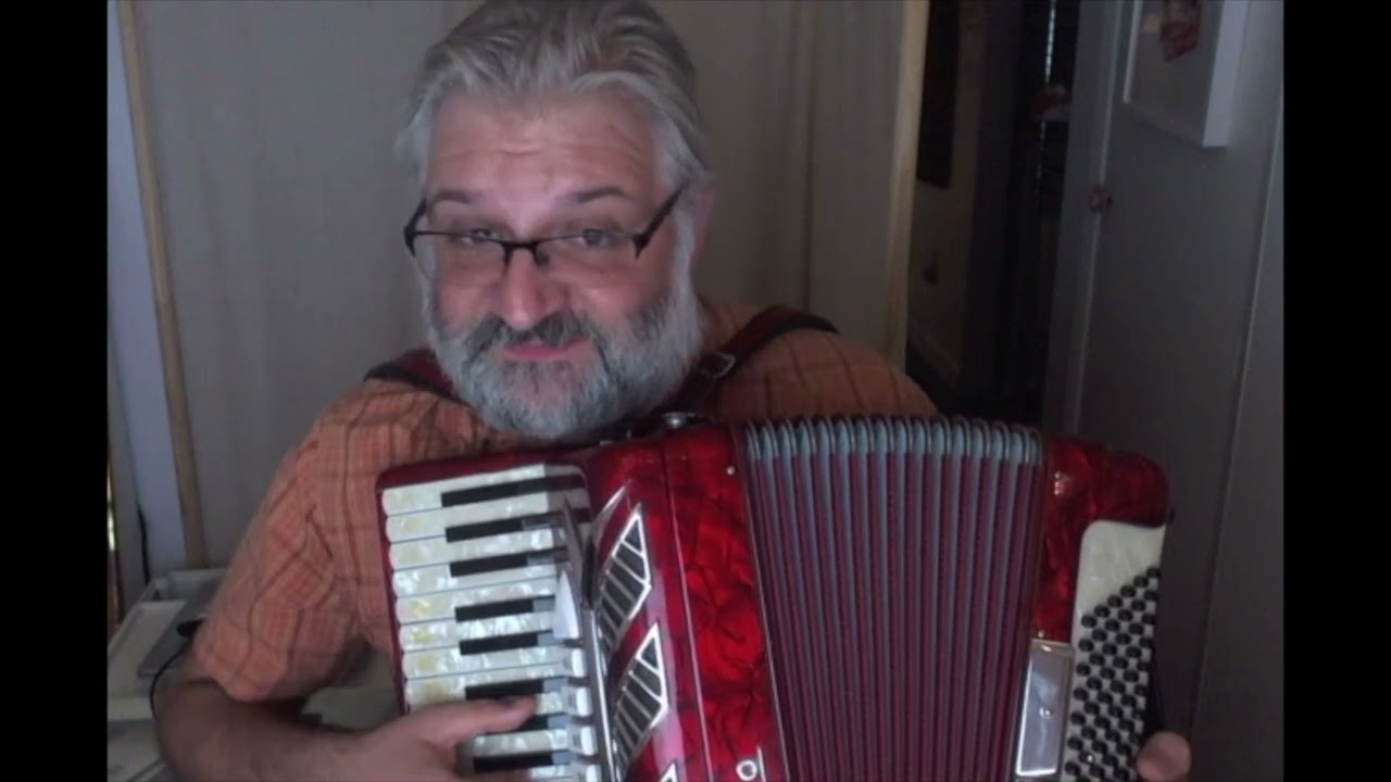 Fidelity Fiduciary Bank (Mary Poppins, 1964) ... played on the accordion!