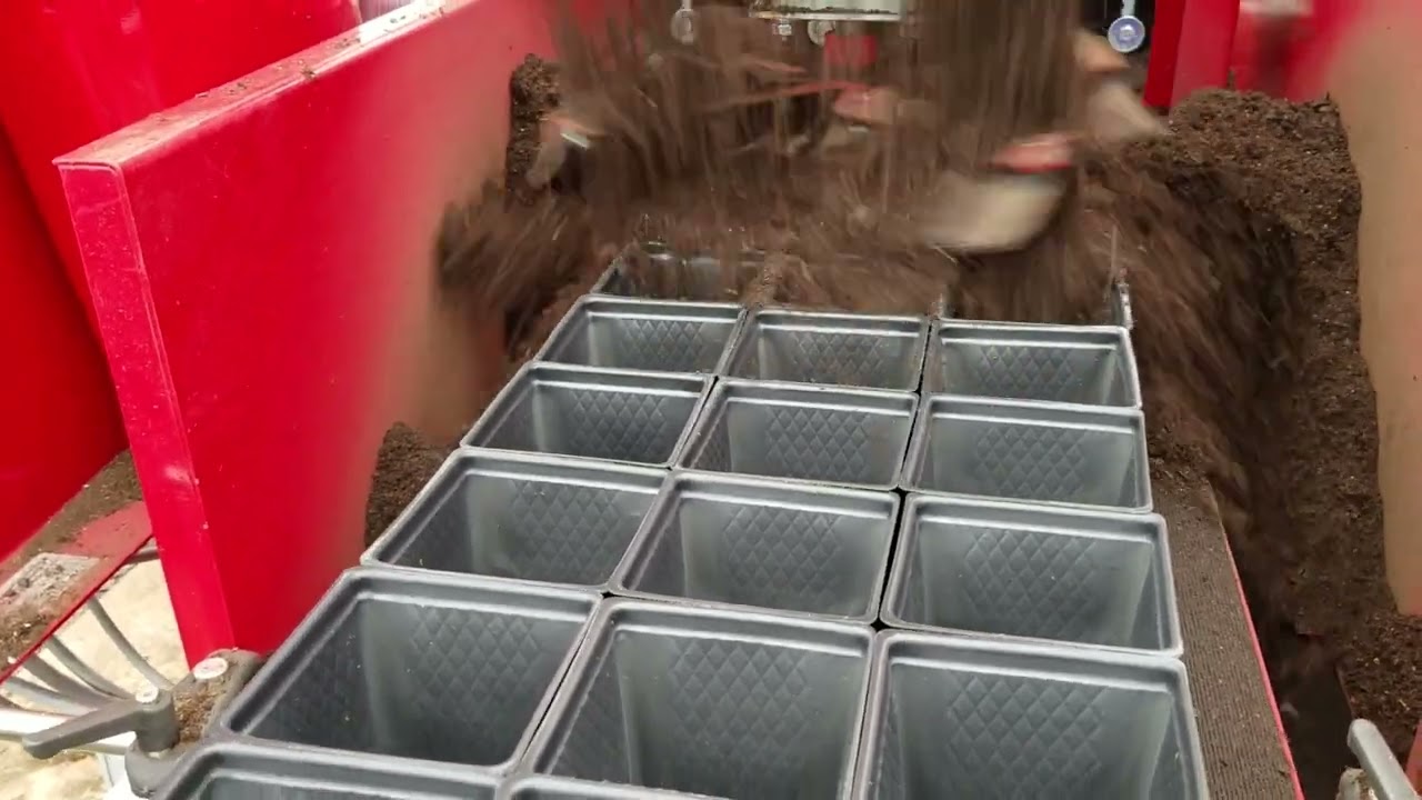 pot filling machine soil mixing machine buy flower seeds www.trailingpetunia.com