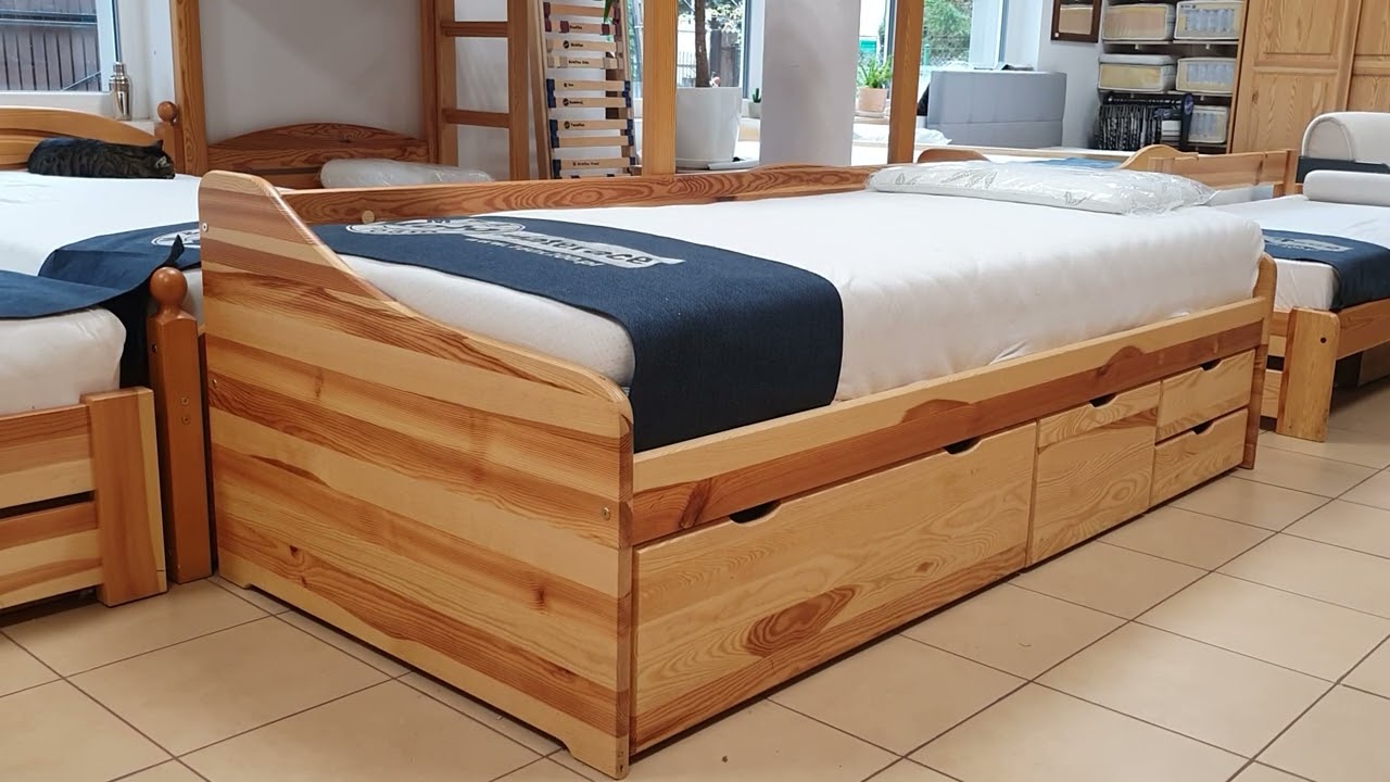 Ł&oacute;żko z podwieszanymi szufladami