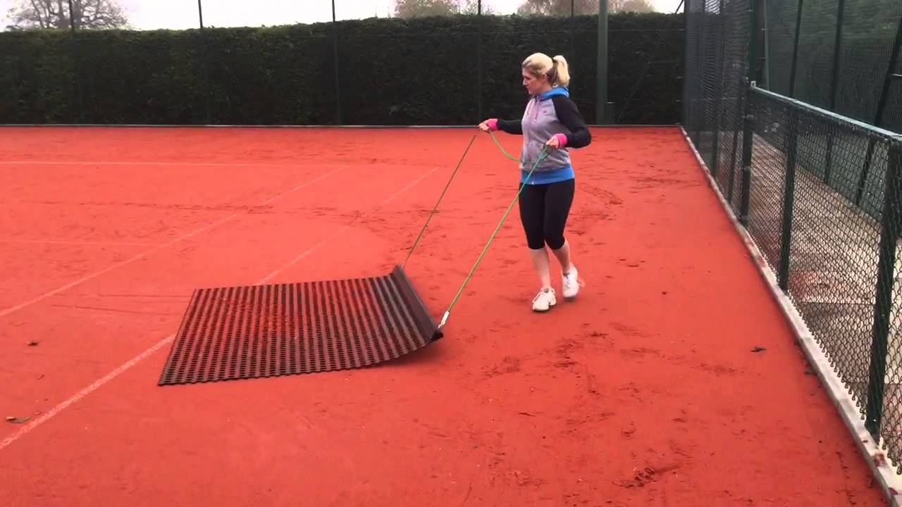 Brushing An Artificial Clay Court