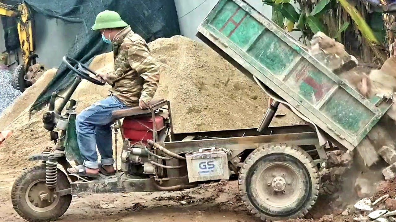 Tractors carrying bricks, tractors dumping soil