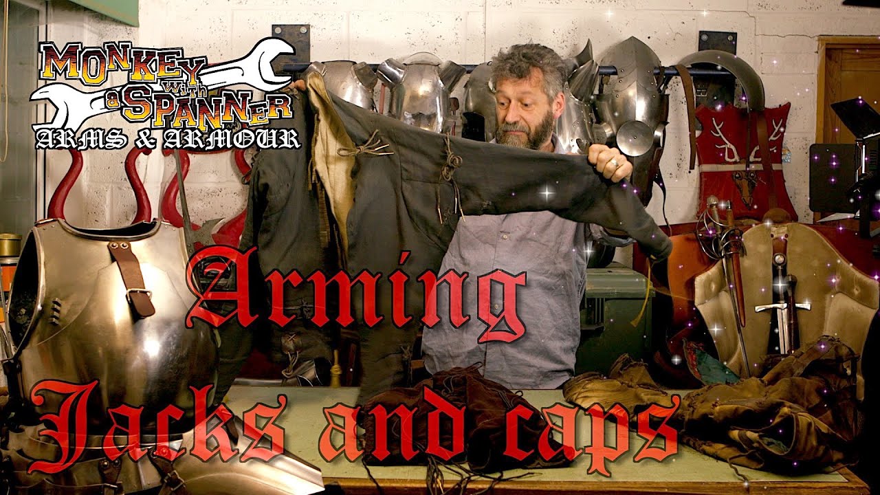 ARMING CAPS & JACKS; Coat with string and a daft hat.