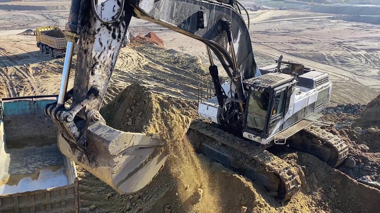 Cat 375 Excavator Loading Soil On 4 Axle Mercedes & MAN Trucks