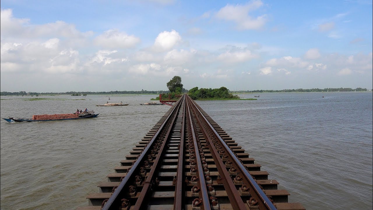 LHB Train Dhumketu Express passing through Dilpashar Chalan Beel- Bangladesh Railway