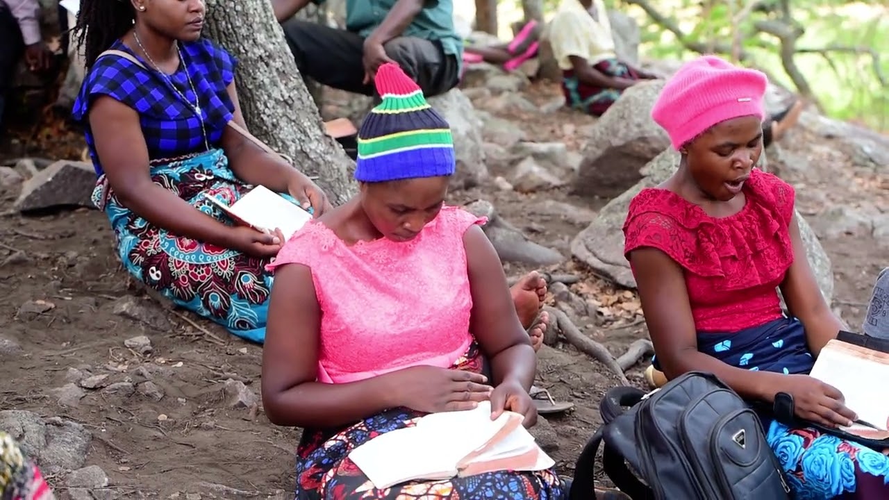 BROTHER ELIJAH KATETE SHARING THE WORD AT KALUNGULU.