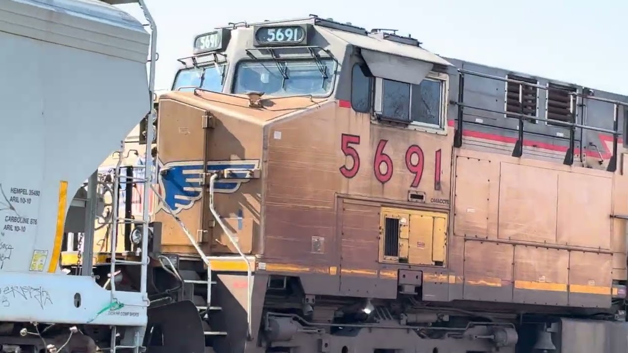 2 Union Pacific Trains, Long Tanker and Ling Mixed.