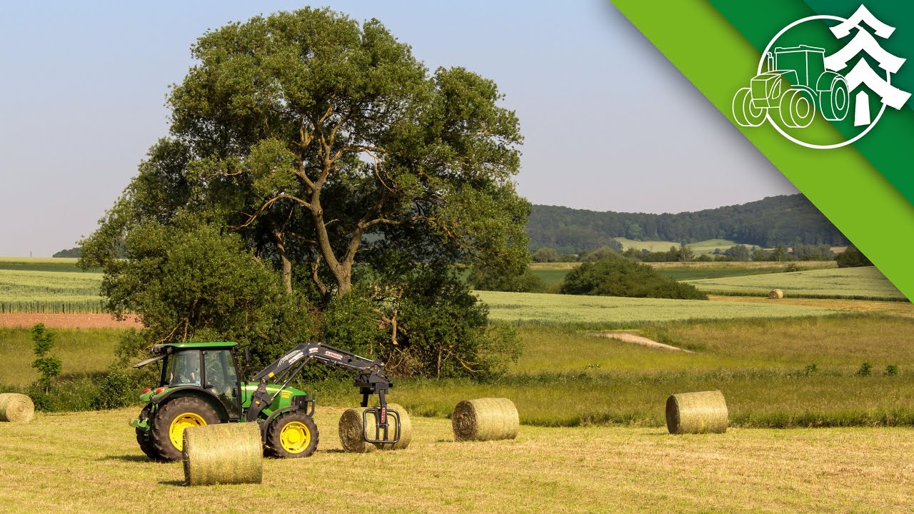 Heuballen fahren mit John Deere 5070 M