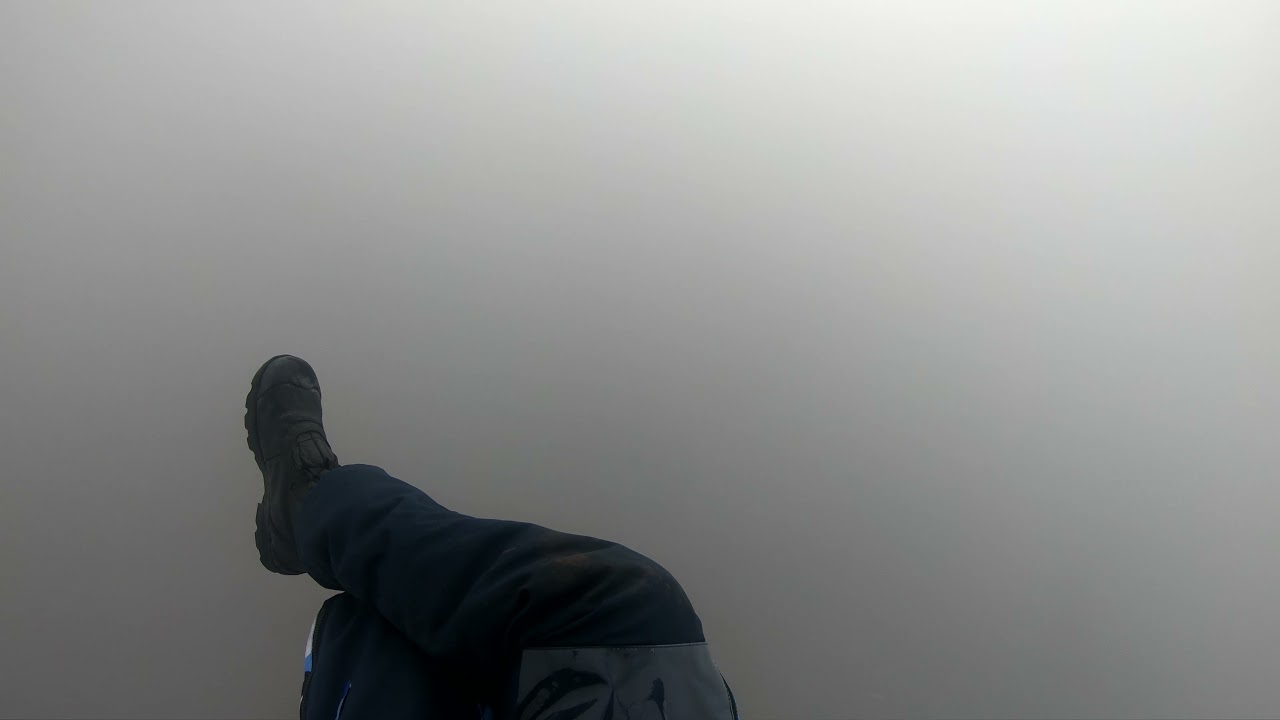 Paramotor fly through a cloud