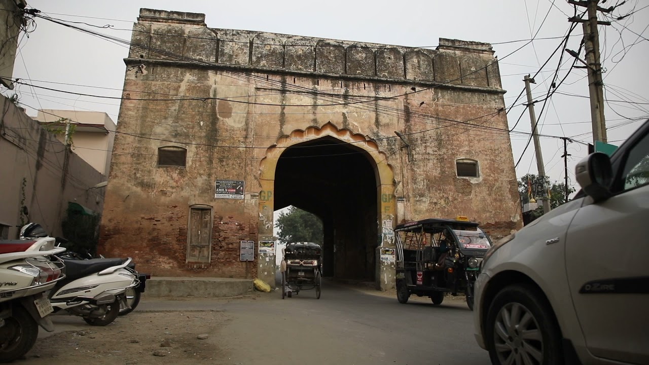 royality free footage of sirhindi gate patiala/city traffic/historical monument