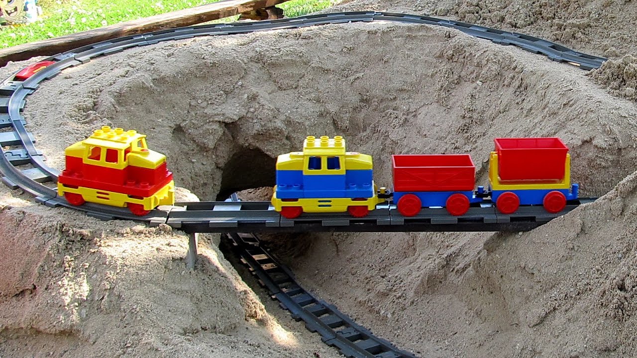LEGO Duplo Train Circuit fail - Outdoor railway in big sandbox, with train accident, part one