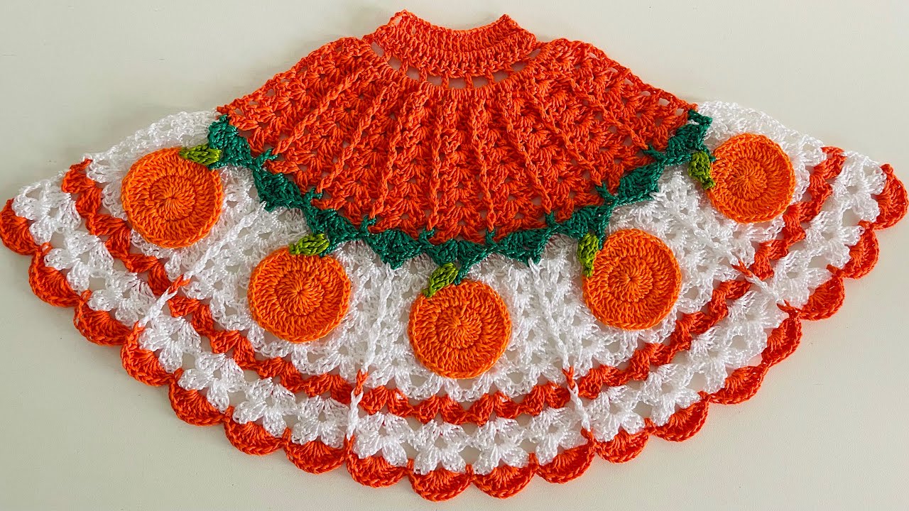 Saia de crochê laranja para boneca pintada em pano de prato