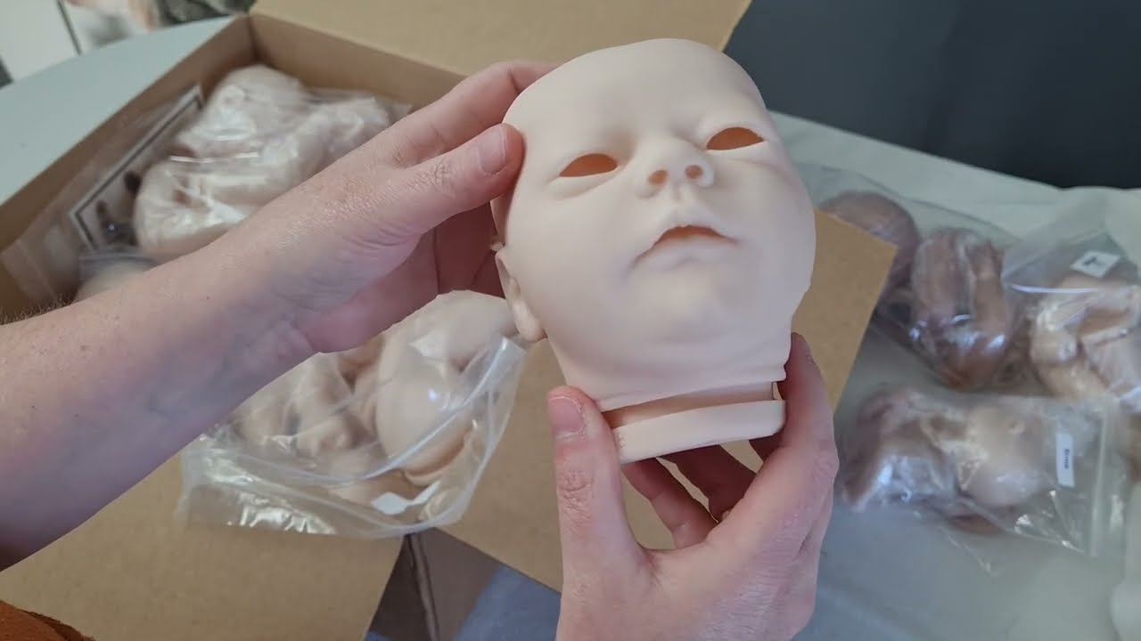 Unboxing doll kits from Bountiful Baby