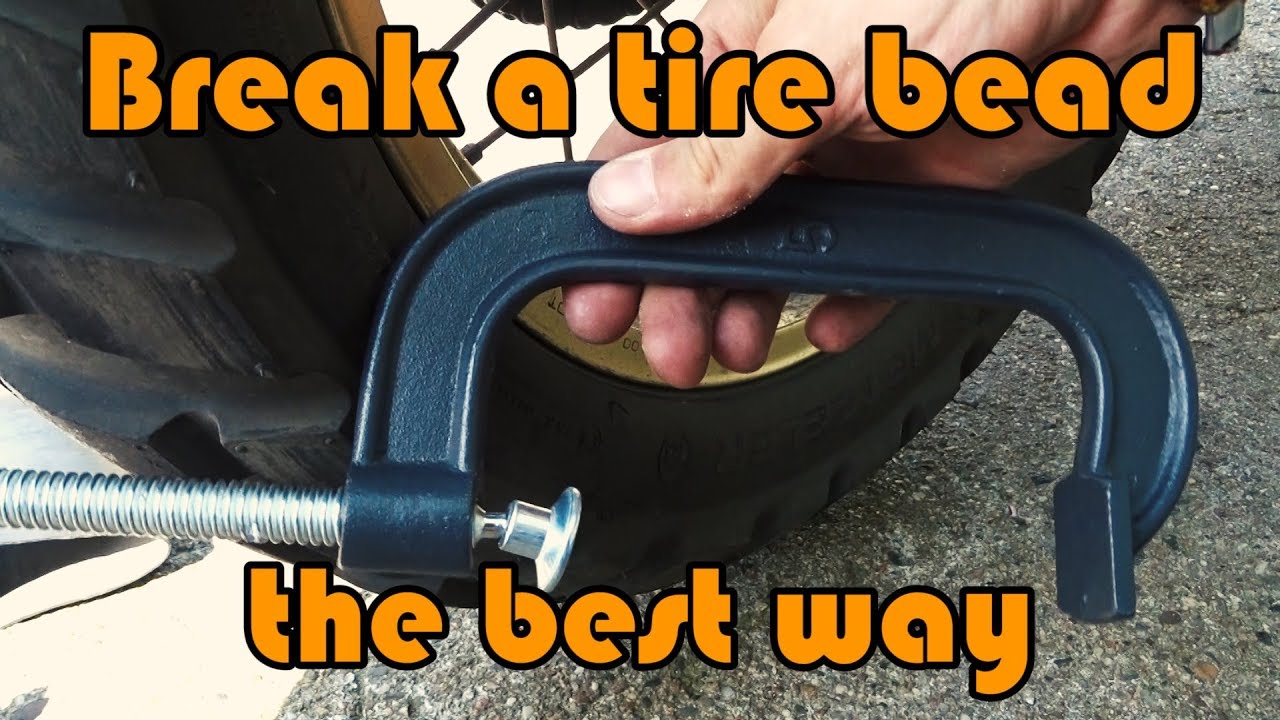 The best way to break a tire bead during motorcycle adventure - using only c clamp