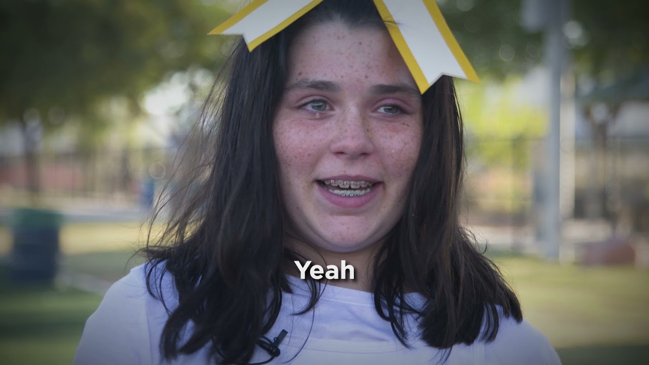 FOX5 Surprise Squad: Raiderettes Surprise Cheerleader, Bringing Her To Tears!
