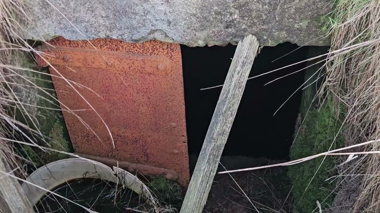 Old well/water tank structure underground 
