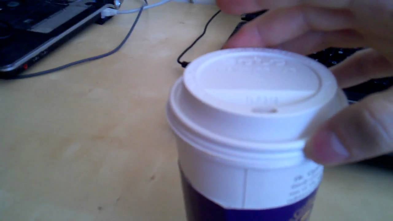 How to correctly put a lid on a coffee cup.