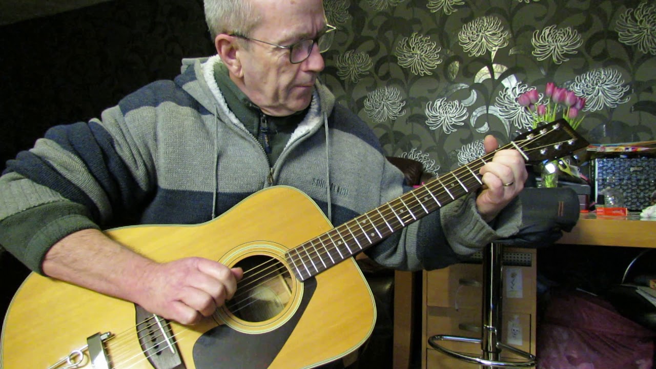 yamaha fg335 1974 with trapeze bridge.