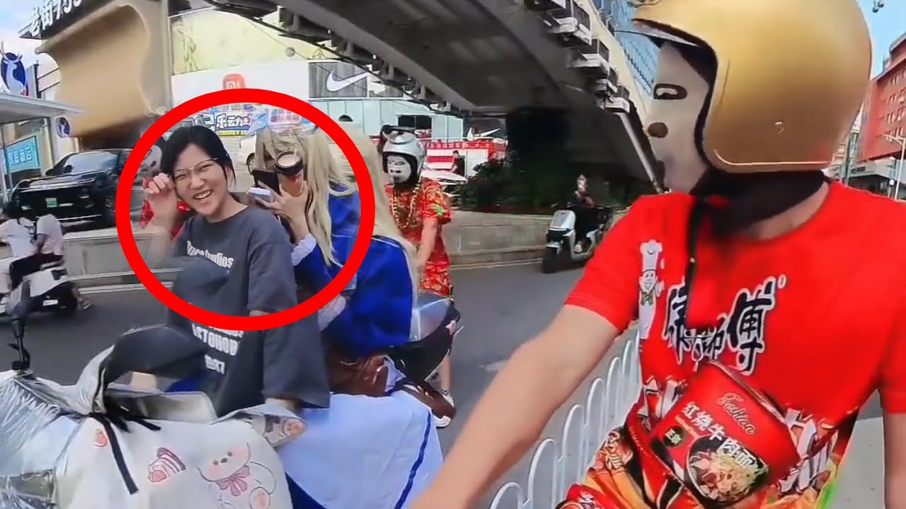 The young lady was double-teamed and burst into laughter