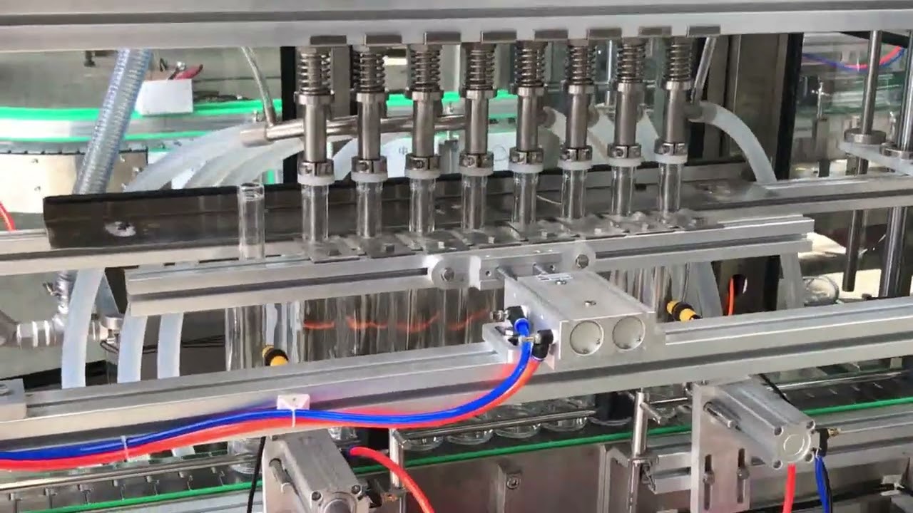 Automatic linear low vacuum negative pressure glass bottle wine beverage filling machine.