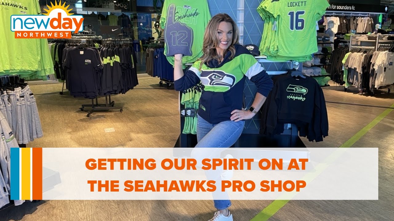 Getting our spirit on at the Seahawks Pro Shop - New Day NW
