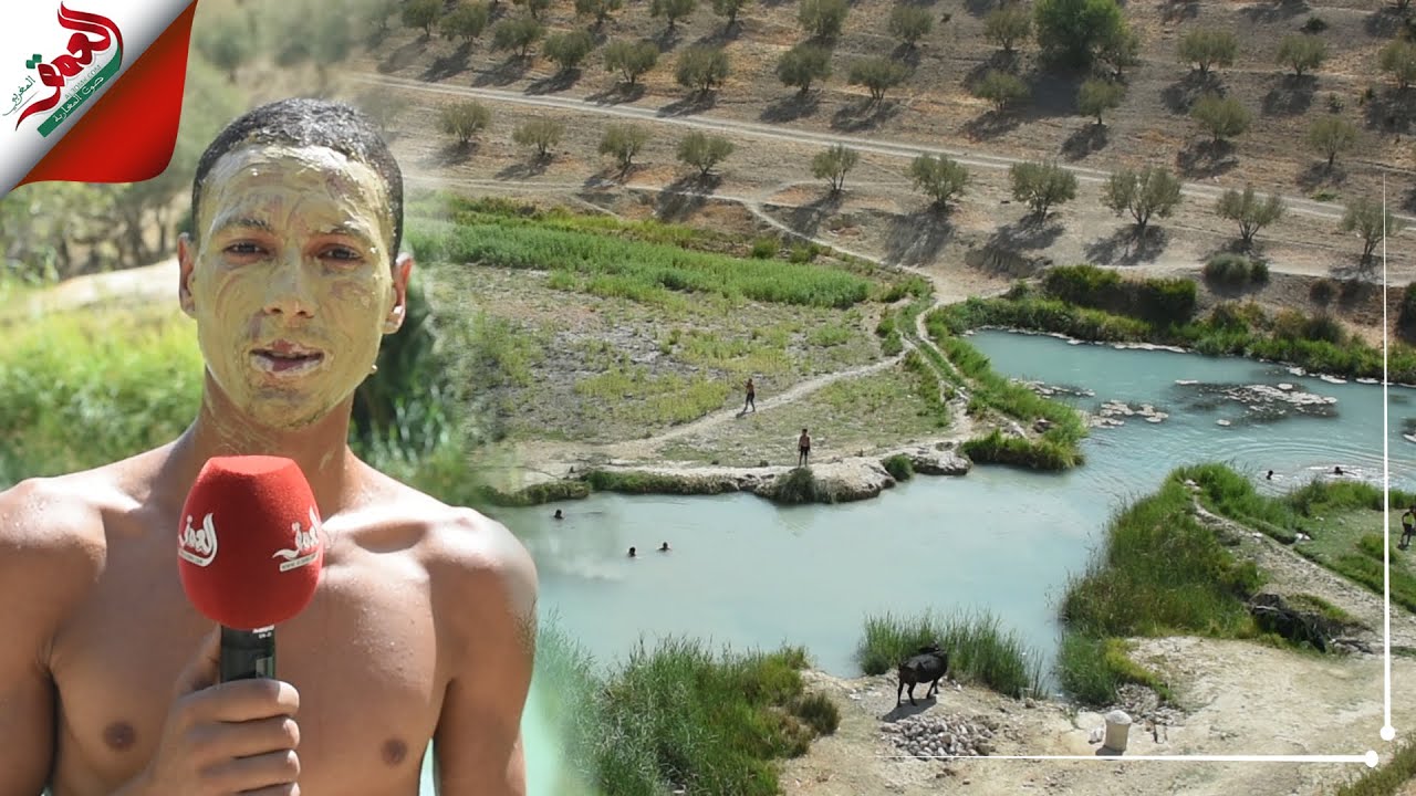 عين 