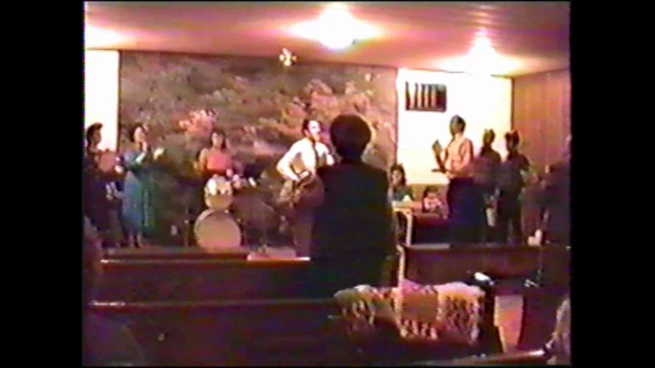 Br. James McCalip and song service at the Oak Grove Holiness Church