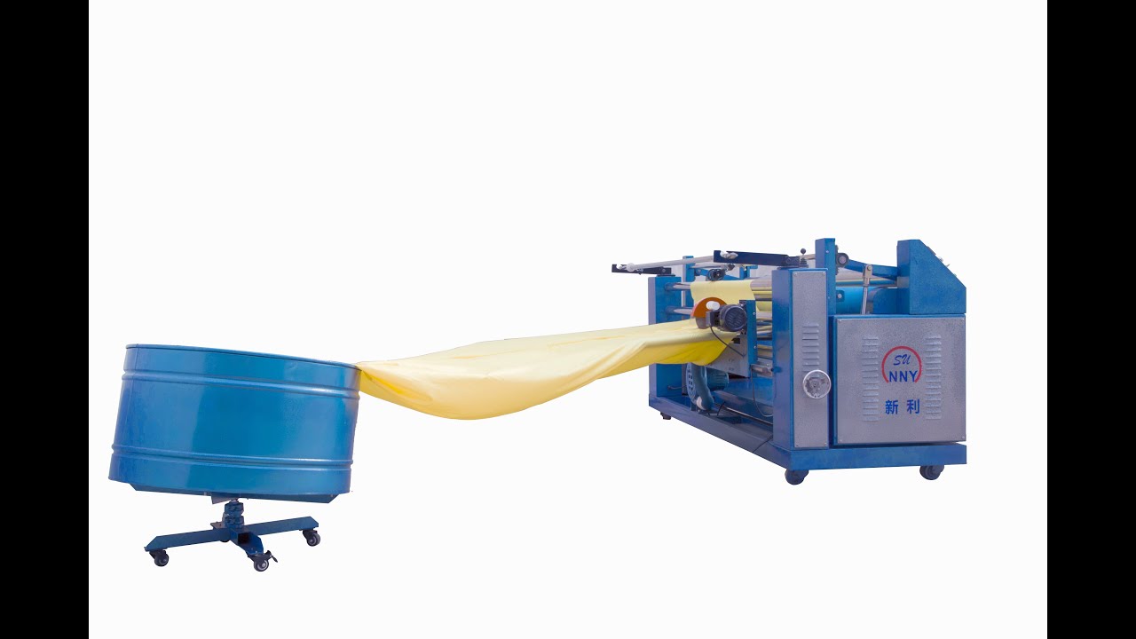 Bias cutter and rewinder machine