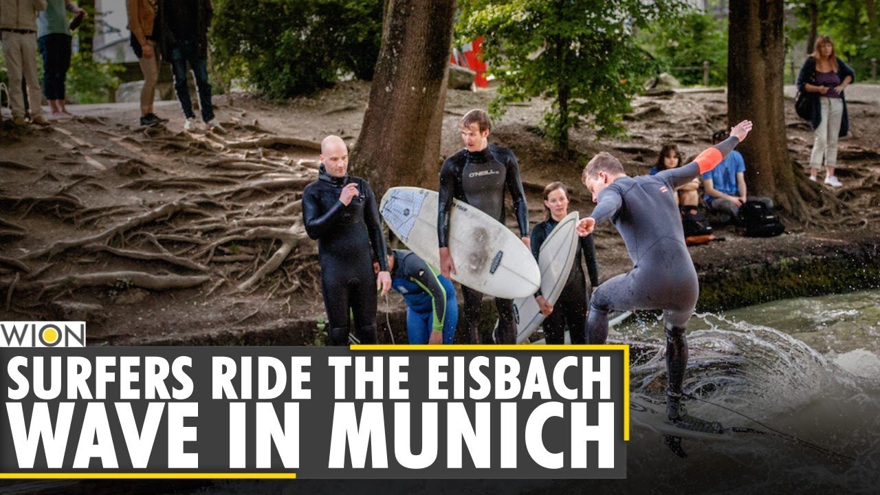 Enthusiastic Munich surfers take turns on the Eisbach waves | Iceberg River World News | WION News