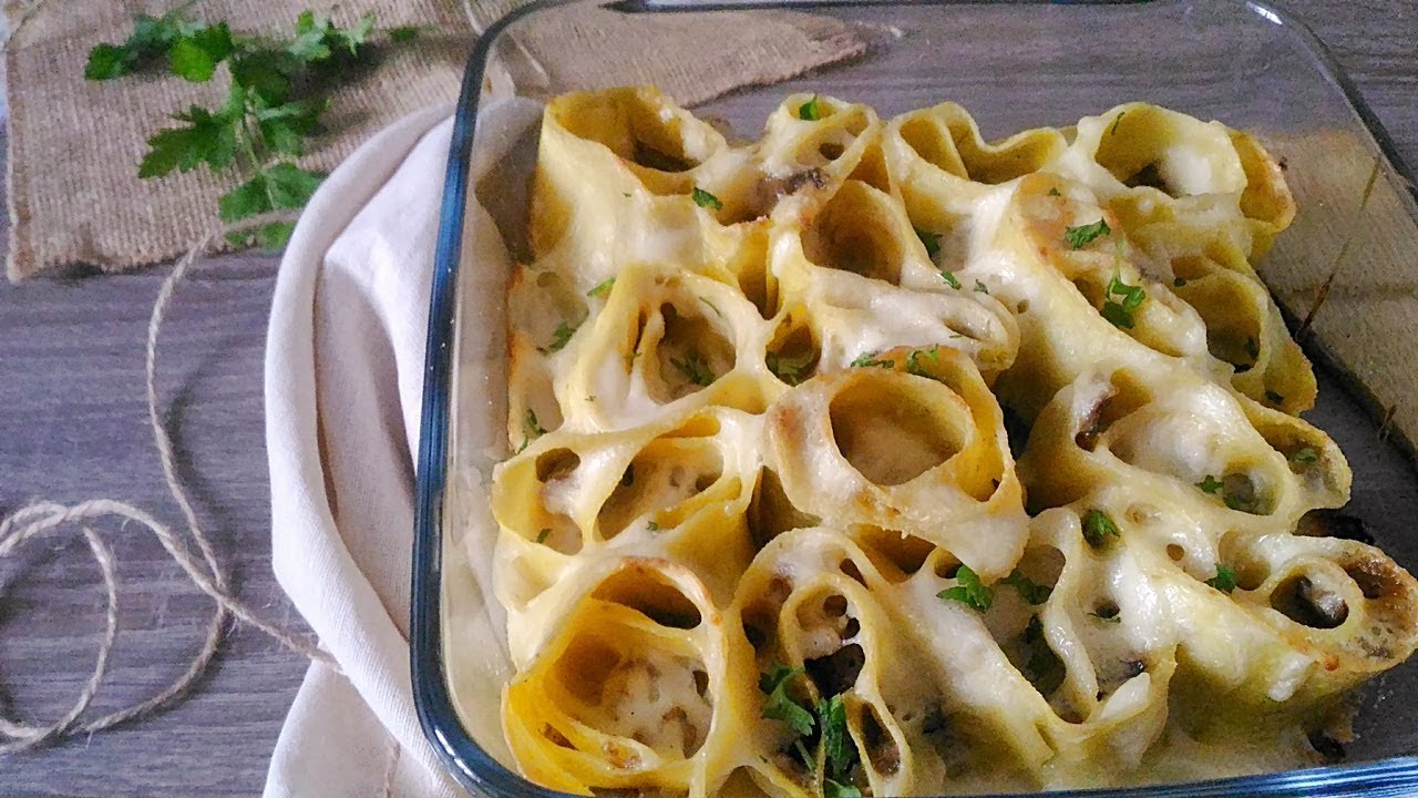 Nidi di lasagna ripieni di funghi e salsiccia