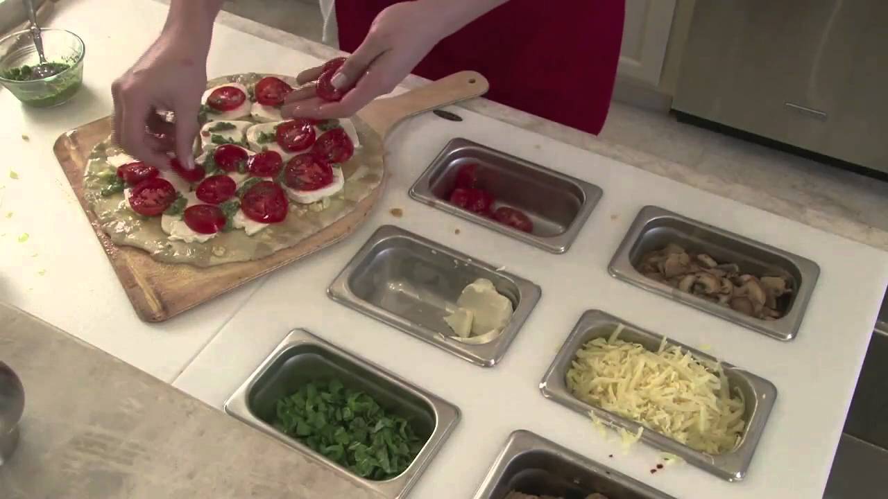 Preparing Pizza at the Galley Kitchen Workstation Denver Colorado