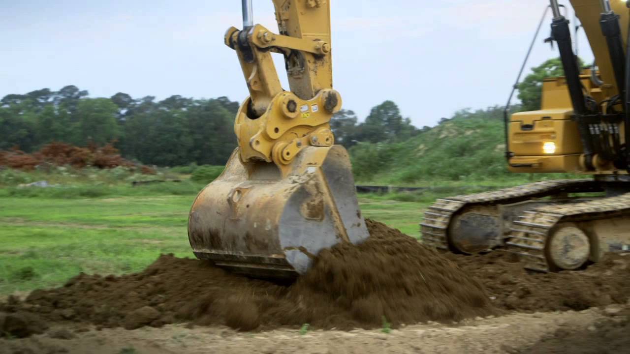 Cat&reg; 326F Hydraulic Excavator at Work Fine Grading