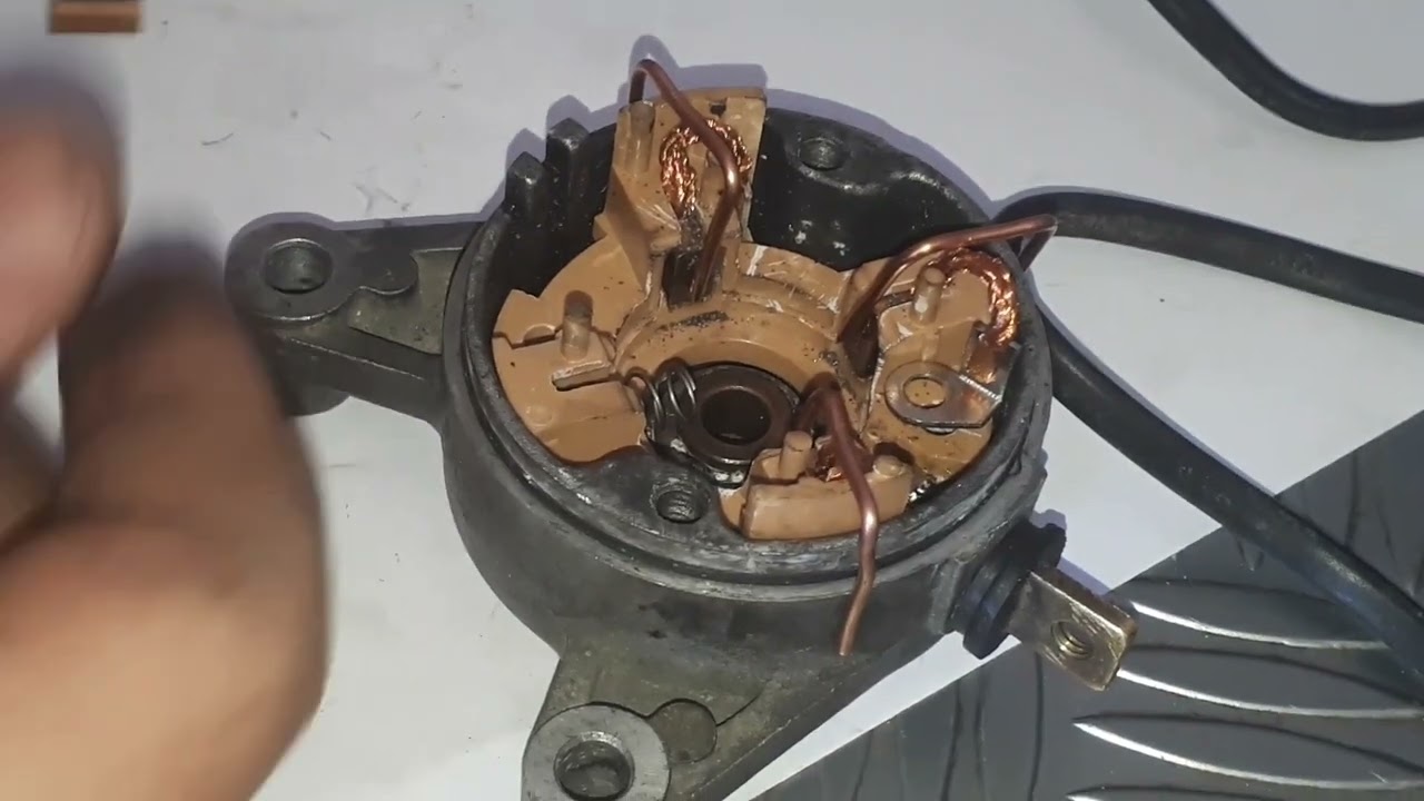 Como cambiar los carbones de el motor de arranque de la suzuki gn 125