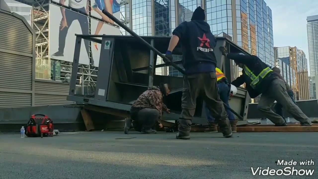 Removing a Giant Roof Top Unit from its curb... without a crane.
