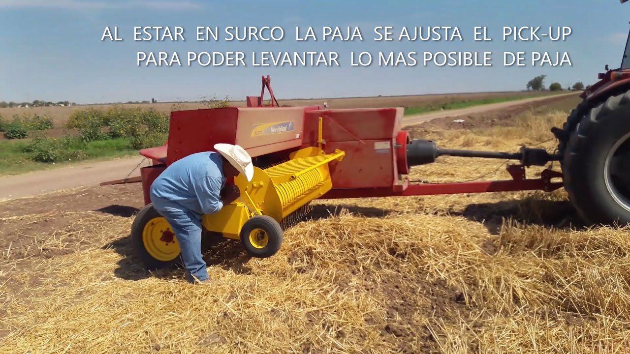 ENTREGANDO  EMPACADORA NEW HOLLAND 5070 NT DE HILO.  EMPACANDO SOCA DE TRIGO. ECHA EN ESTADOS UNIDOS