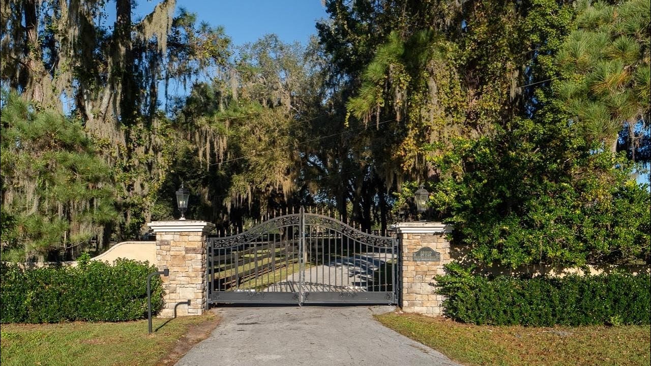 19+ ACRE EQUESTRIAN COMPOUND! 23 STALLS, GENTRY ARENA, POOL & TENNIS COURT NEAR WEC!
