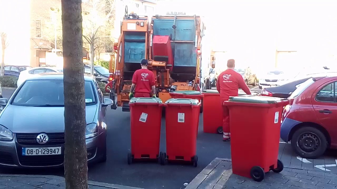 The city bin co bin lorry collecting recycling
