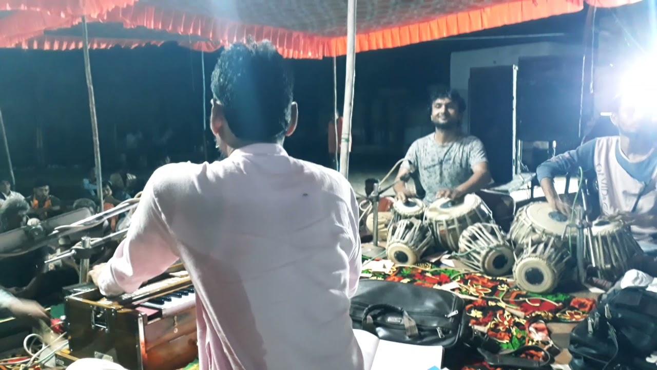 Manhargiri Goswami and Jitu bagda ustad.