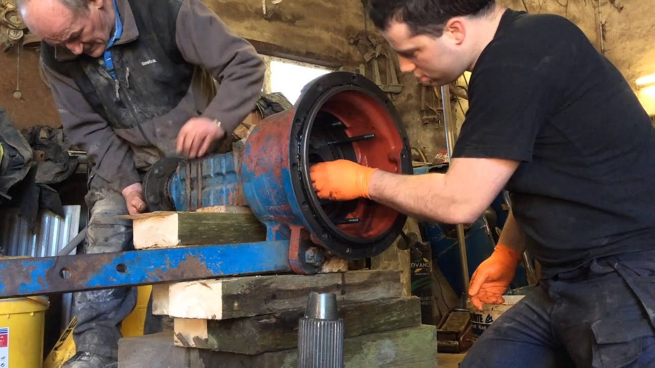 How to replace brakes in rear axle Ford 4100 Tractor