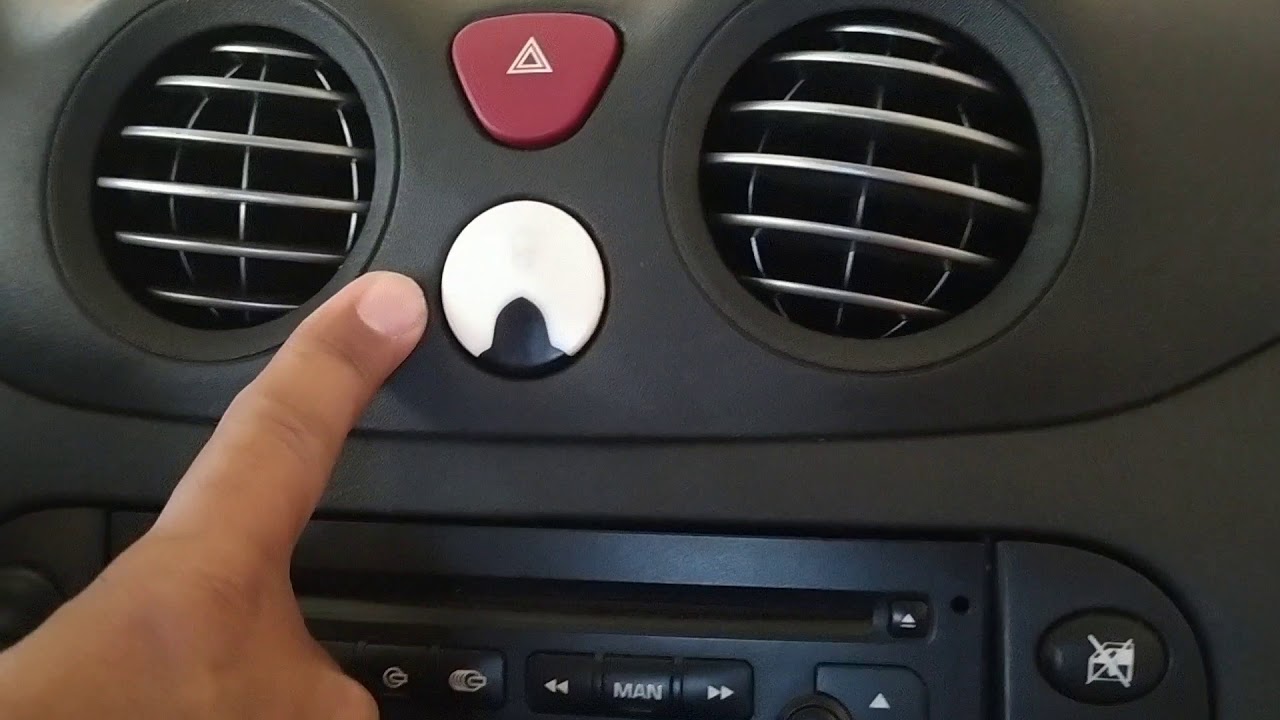Como retirar o som e o botão de travamento do carro do Citroen C3?!!