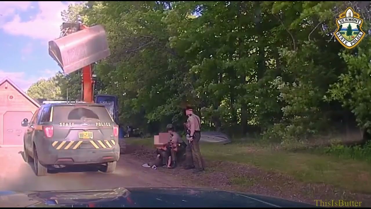 Man attacks police with an EXCAVATOR