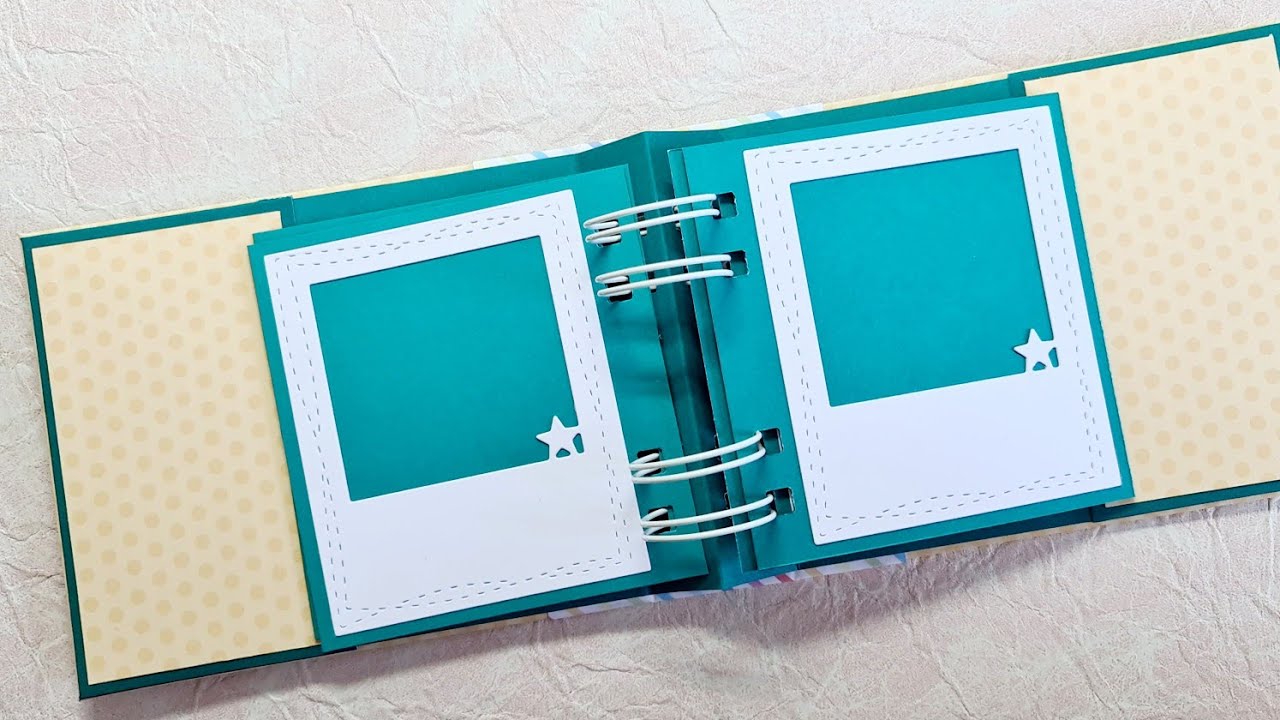 Mini album with cinch and hard cover