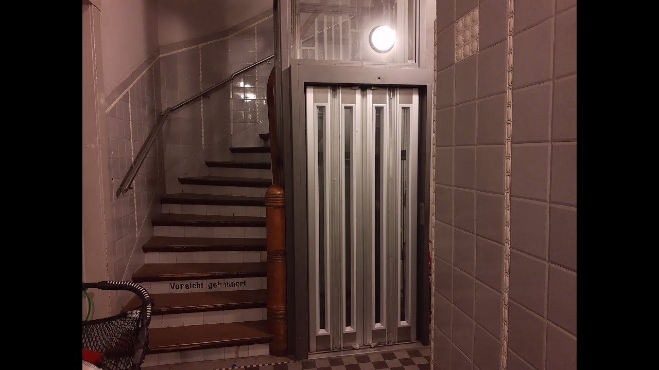 Folding shaft doors! 2002 scenic HUS elevator at flats in Hamburg, Germany