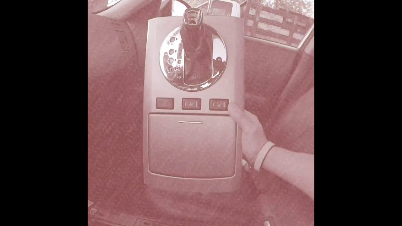 DIY : Infiniti FX35 Clock Assembly and Shifter Cup Holder Assembly Removal