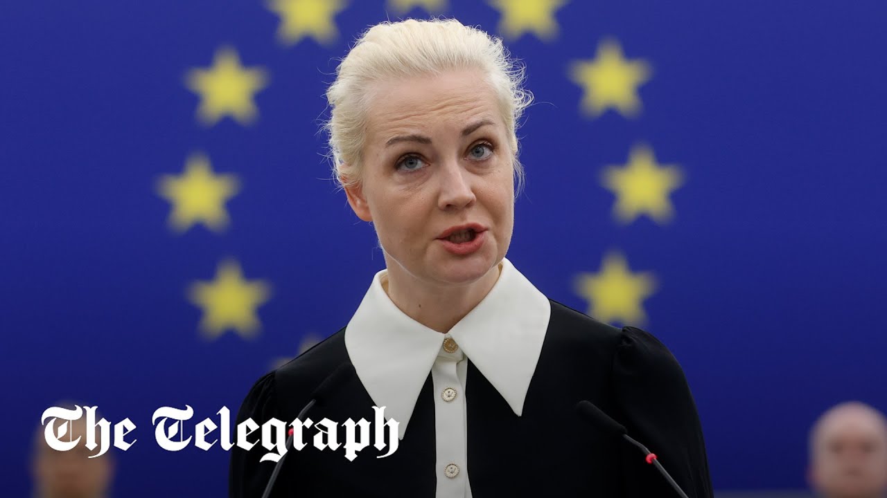 Alexei Navalny’s body ‘abused’ says wife as she holds back tears