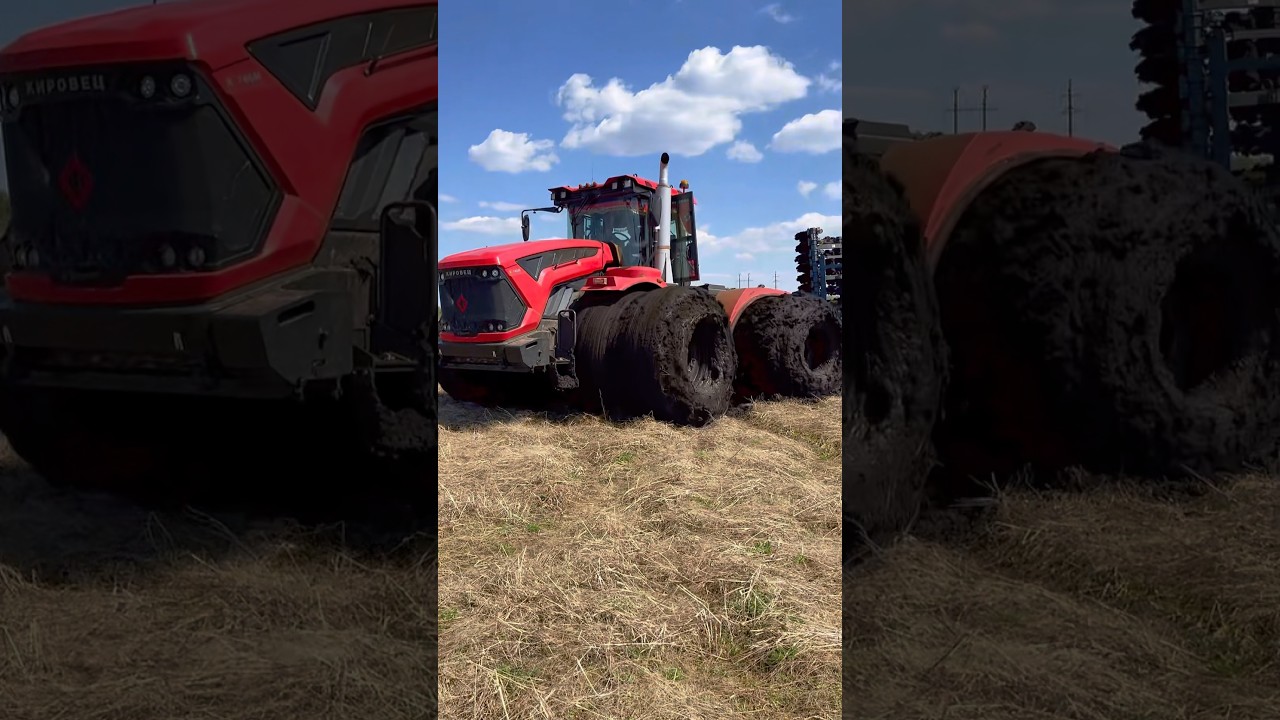 GIANT TRACTOR SINKS INTO MUDDY LAND IN THE FIELD