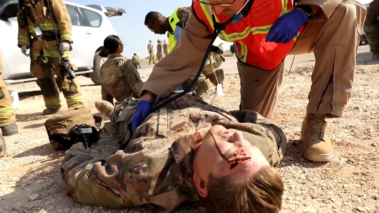 Airmen with the 332nd Air Expeditionary wing participate with Major Accident Response Exercise