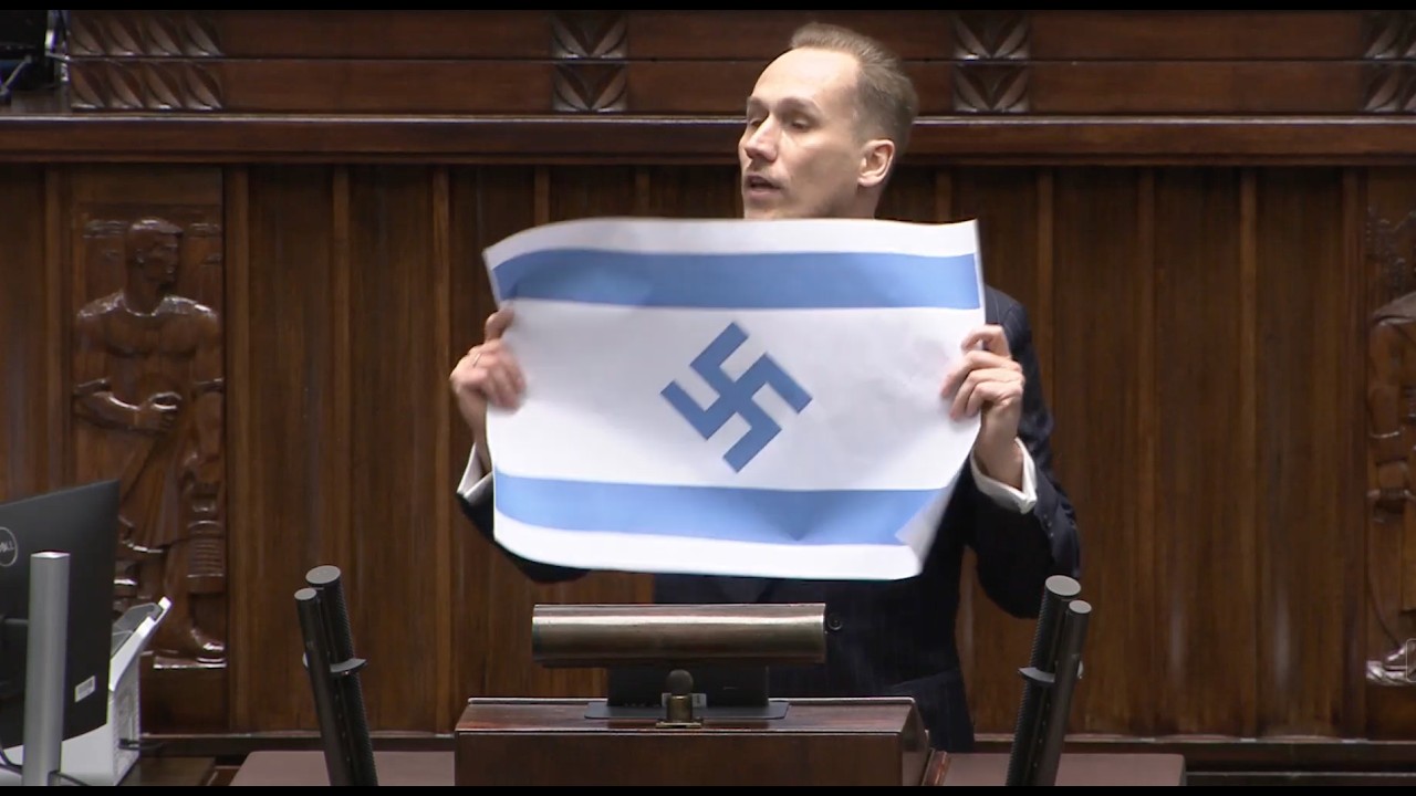 SKANDAL W SEJMIE! Berkowicz pokazuje flagę i por&oacute;wnuje Izrael do III Rzeszy!